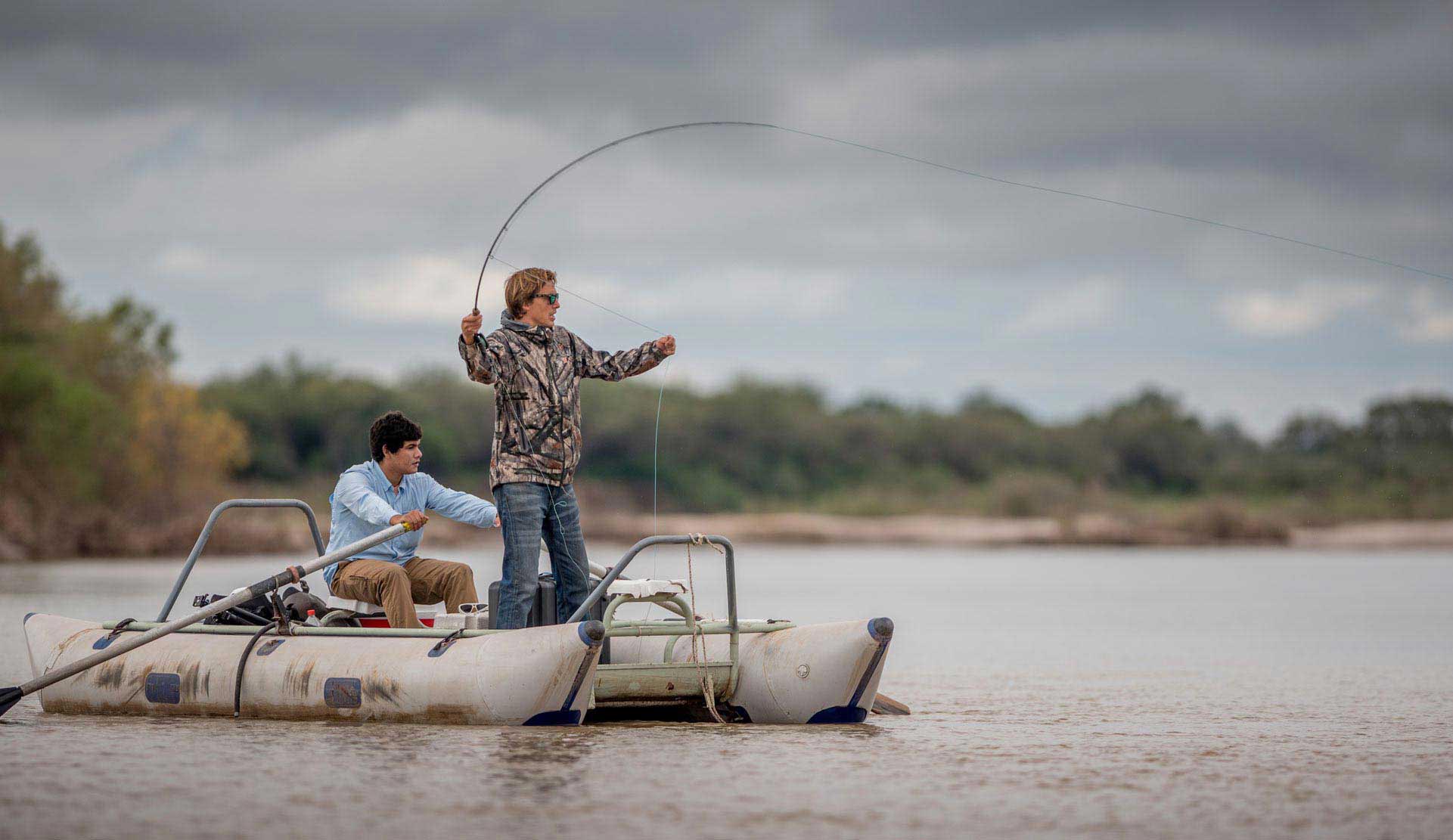 Fishing dorado in a crystal-clear water